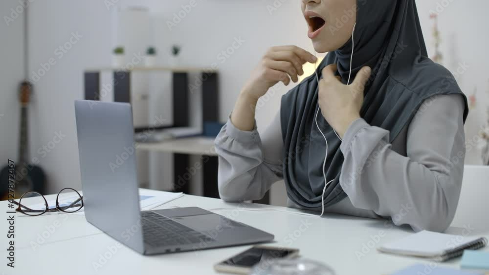 Muslim female tutor teaching students online by video chat, distance education Muslim female tutor teaching students online by video chat, distance education