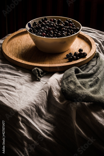 Blackcurrants in a bowl still life