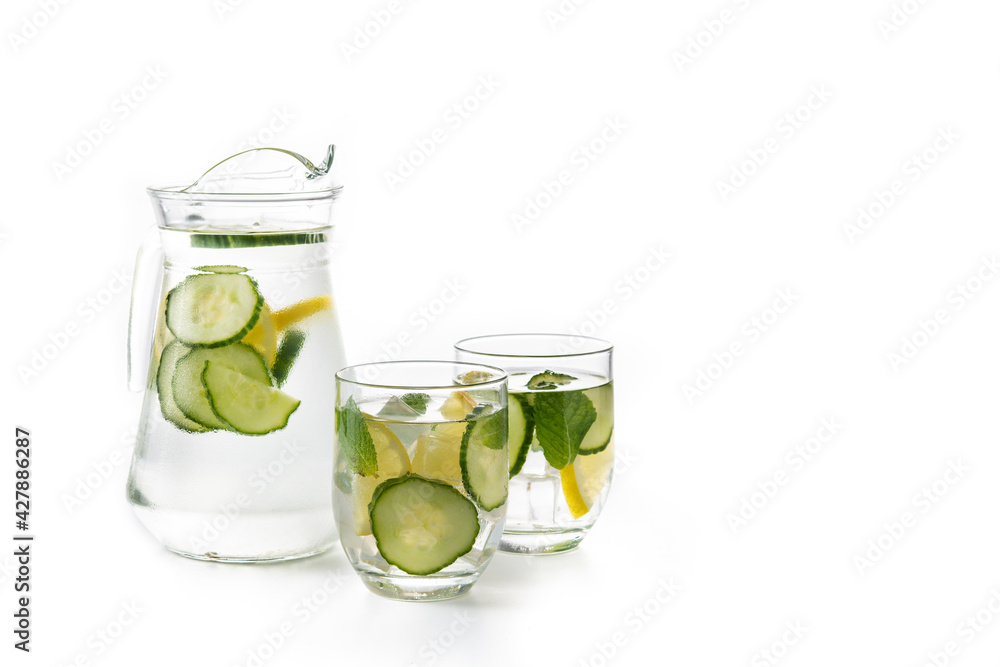 Sassy water or water with cucumber and lemon isolated on white background. Copy space Sassy water or water with cucumber and lemon isolated on white background. Copy space