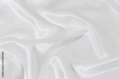 White silk fabric texture close up. Abstract background.