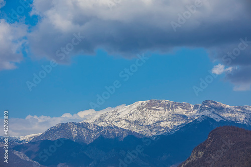 Snow-capped Caucasus mountains in spring.