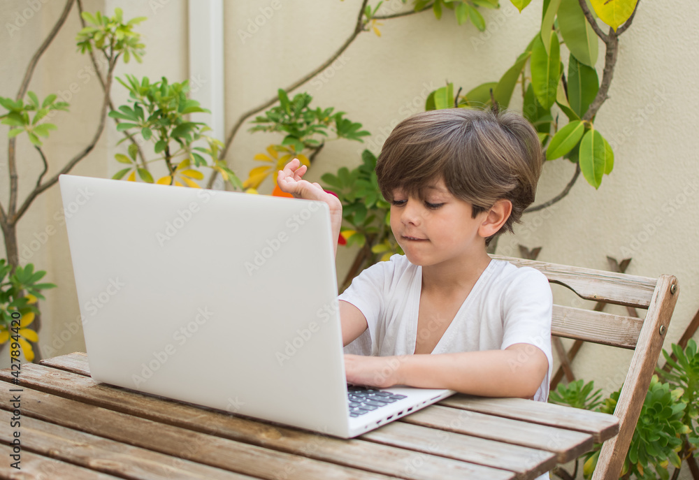 Smart Boy Doing Homework On Laptop.
Concentrated Schoolboy Typing On Laptop Keyboard While Studying Online At Home. Smart Boy Doing Homework On Laptop.
Concentrated Schoolboy Typing On Laptop Keyboard While Studying Online At Home.