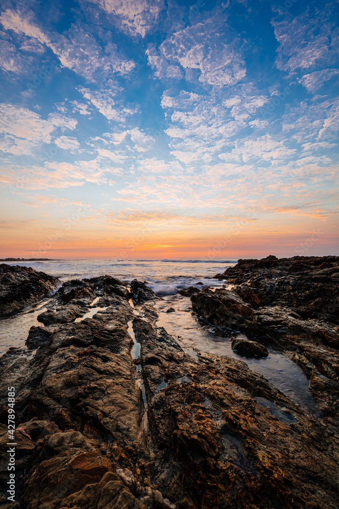 Vertical view of a beautiful coastal sunrise at Middleton Beach, South Australia, Australia.
