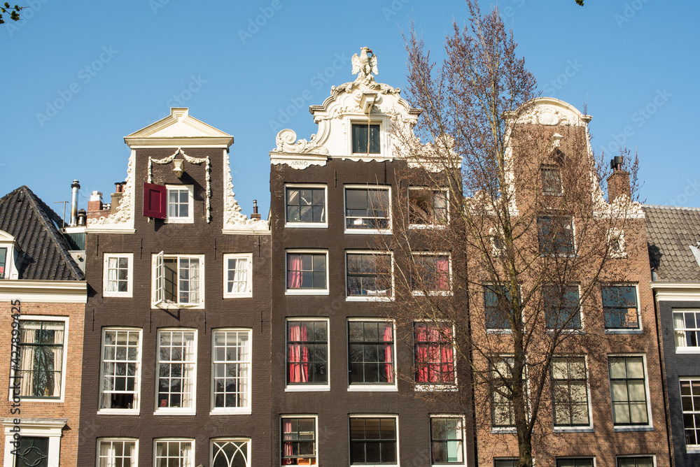 beautiful canal houses and bridges in Amsterdam