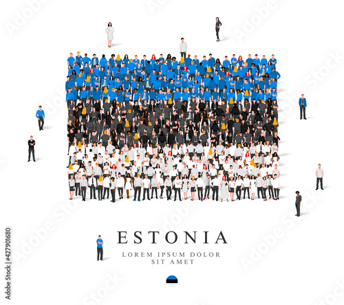A large group of people are standing in black, blue and white clothes, symbolizing the flag of Estonia.