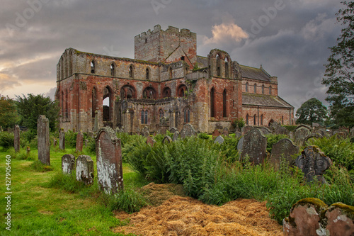 Medieval Lanercost Priory was founded about 1165 by Henry II and was completed in 1220. It fell into ruin after the dissolution of the monasteries by Henry VIII in 1537 photo