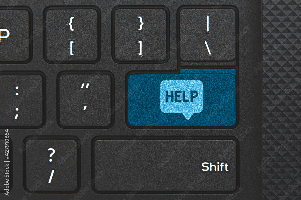 Help icon on computer keyboard key. Concept of help online Help icon on computer keyboard key. Concept of help online