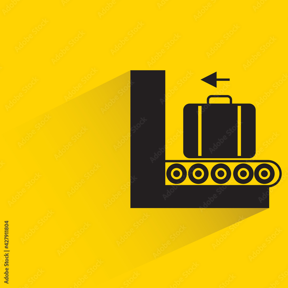 baggage conveyor belt at the airport with shadow on yellow background baggage conveyor belt at the airport with shadow on yellow background