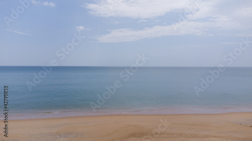 Beautiful scene of beach and white sand background  © manachai