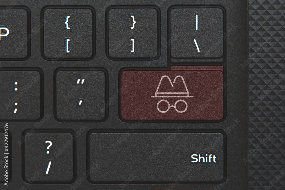 Incognito icon on PC keyboard key. Conceptual idea of anonymous Incognito icon on PC keyboard key. Conceptual idea of anonymous
