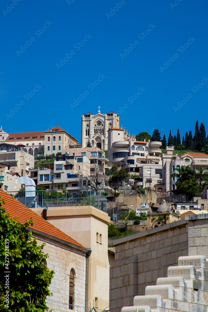 the church of the adolescent jesus in Nazareth at Chrismas among the houses, bottom view