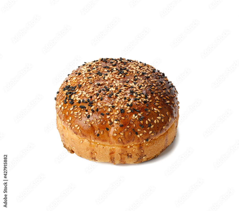 baked round burger bun isolated on white plate baked round burger bun isolated on white plate