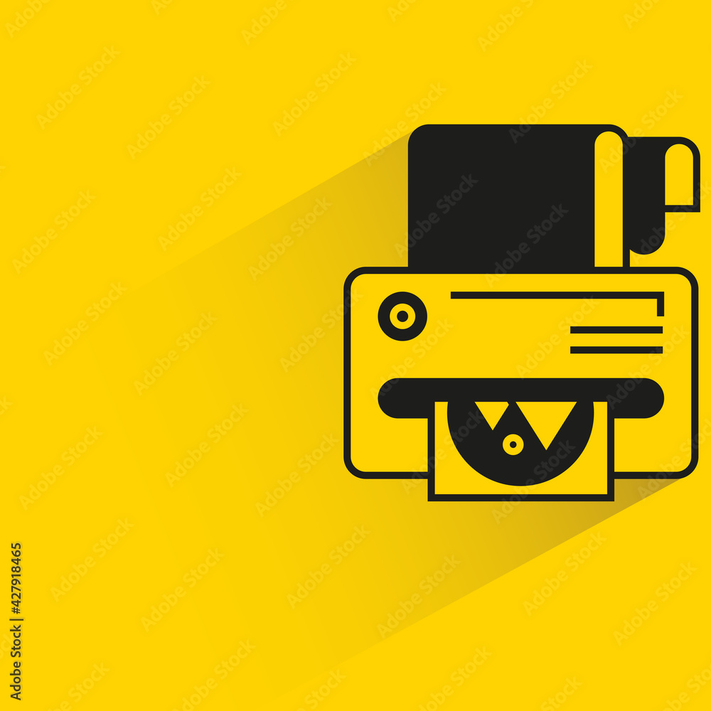 printer with shadow on yellow background