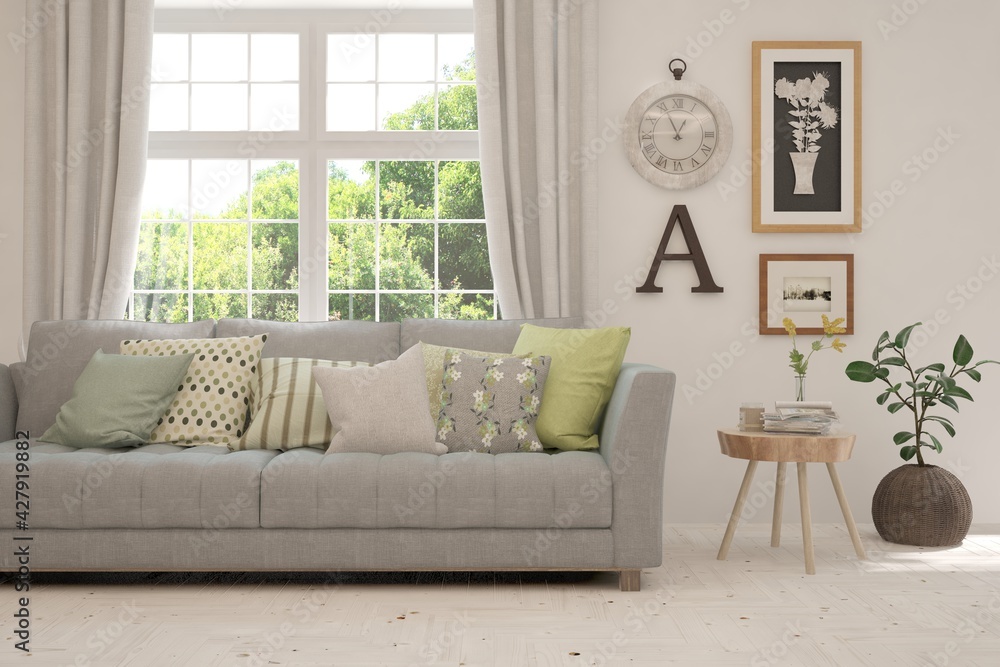 Fototapeta premium White living room with sofa and summer landscape in window. Scandinavian interior design. 3D illustration