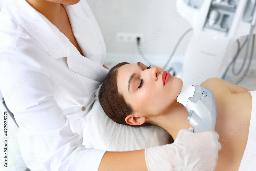 Fototapeta premium Woman getting SMAS lifting procedure in beauty clinic