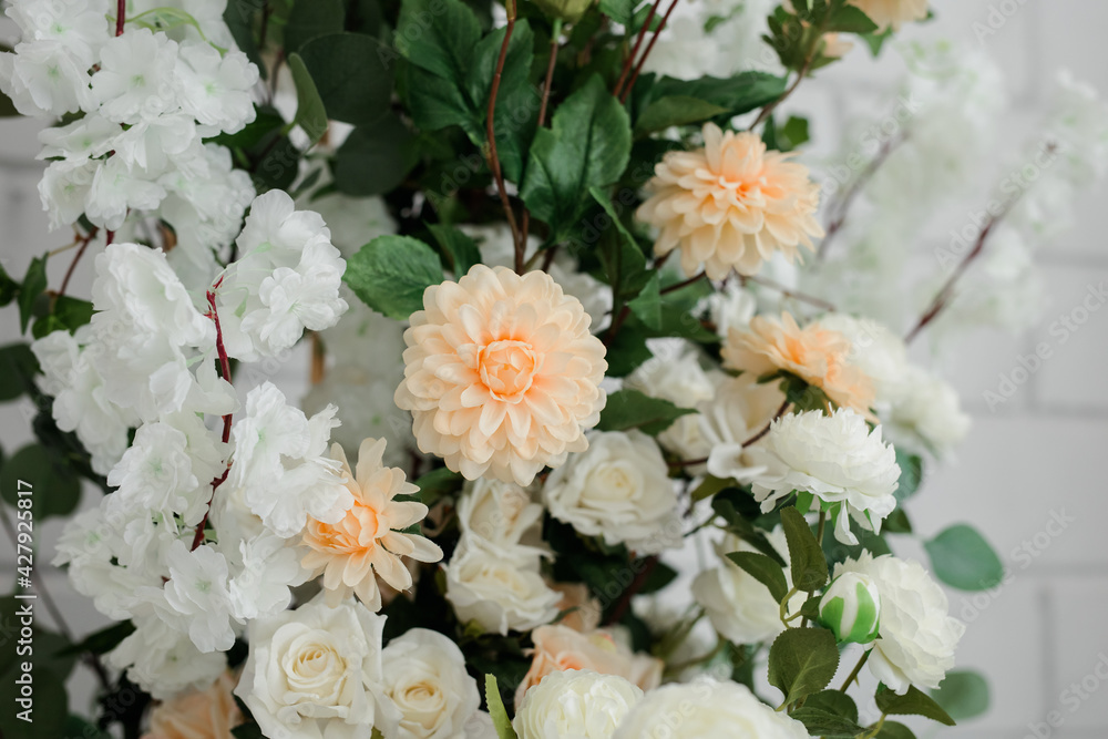 close-up of artificial flowers of white and pink color in the room. close-up of artificial flowers of white and pink color in the room.