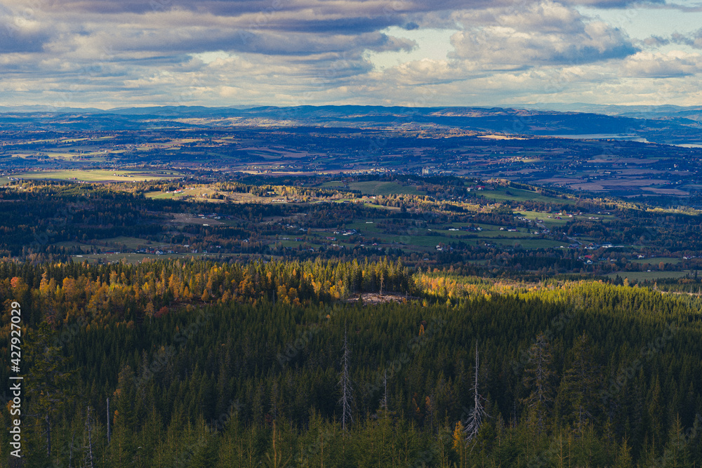 View of rural Toten, Norway, seen from the Totenåsen Hills in autumn.