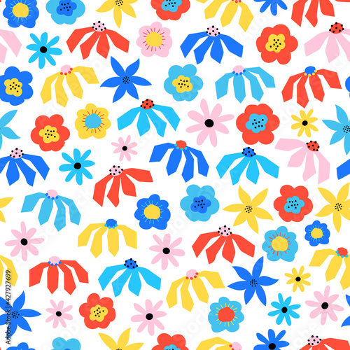 Abstract flowers seamless vector pattern blue red yellow pink white. Floral repeating background Scandinavian style for wallpaper, fabric, textiles, home decor. Hand drawn surface pattern design.
