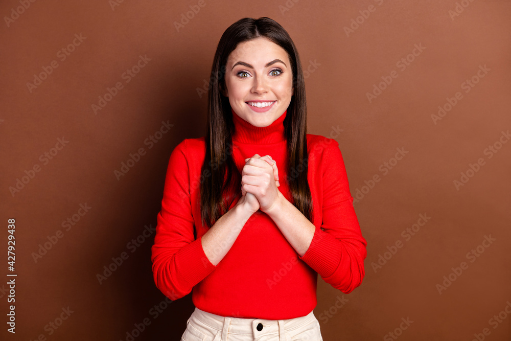 Portrait of charming positive person folded arms palms look camera toothy smile isolated on brown color background Portrait of charming positive person folded arms palms look camera toothy smile isolated on brown color background