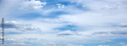 Abstract image of blurred sky. Blue sky background with cumulus clouds