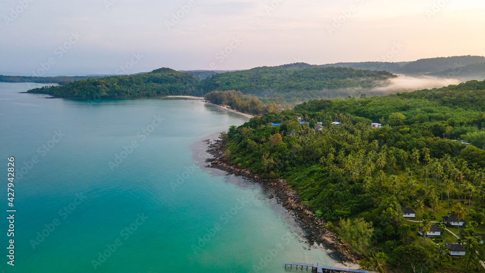 Aerial view of nature tropical paradise island beach enjoin a good summer beautiful time on the beach with clear water and blue sky in Koh kood or Ko Kut, Thailand. Aerial view of nature tropical paradise island beach enjoin a good summer beautiful time on the beach with clear water and blue sky in Koh kood or Ko Kut, Thailand.