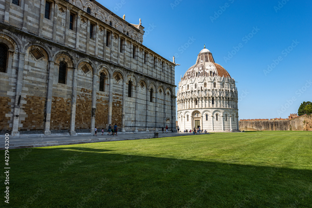 Pisa, Piazza dei Miracoli (Square of Miracles) with the Cathedral (Duomo di Santa Maria Assunta) and the Baptistery (Battistero di San Giovanni), Tuscany, Italy, Europe.