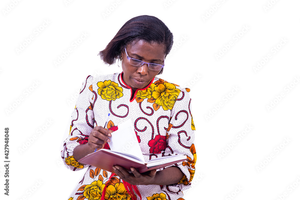 adult businesswoman turning page and reading notes in notebook. adult businesswoman turning page and reading notes in notebook.