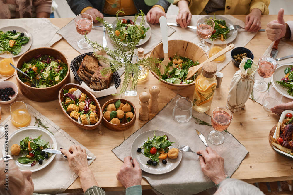 High angle view of dining table with different dishes serving for holiday dinner High angle view of dining table with different dishes serving for holiday dinner