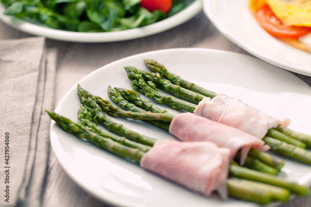 Ham rolls with asparagus. High quality photo. Ham rolls with asparagus. High quality photo.