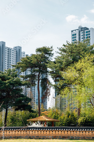 Hwarang Recreation Area park and modern apartment buildings in Ansan, Korea