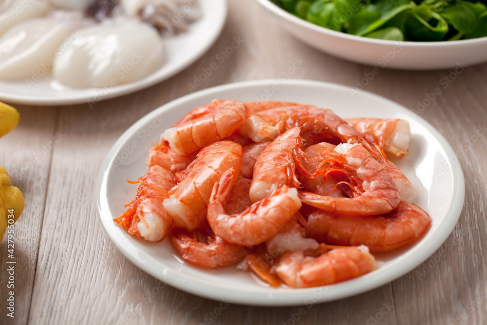 Raw shrimp and cuttlefish. High quality photo. Raw shrimp and cuttlefish. High quality photo.