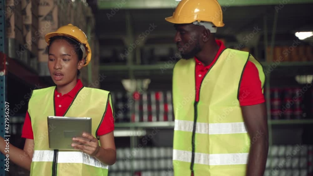 African American worker was checking the goods inside the warehouse
African American worker was checking the goods inside the warehouse