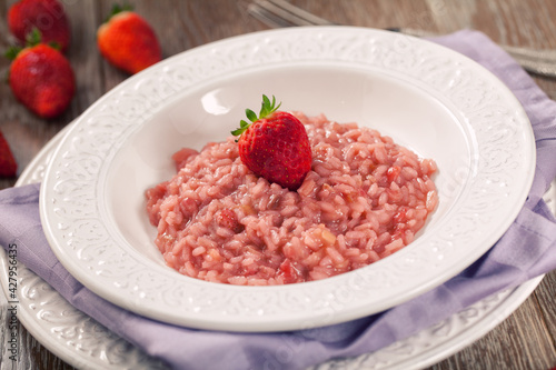 Risotto With Strawberries on a plate. High quality photo.