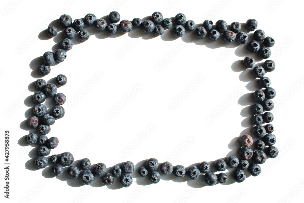 Blueberry isolated on a white background. Healthy food, raw food diet. Frame made of berries. Place for text. Blueberry isolated on a white background. Healthy food, raw food diet. Frame made of berries. Place for text.