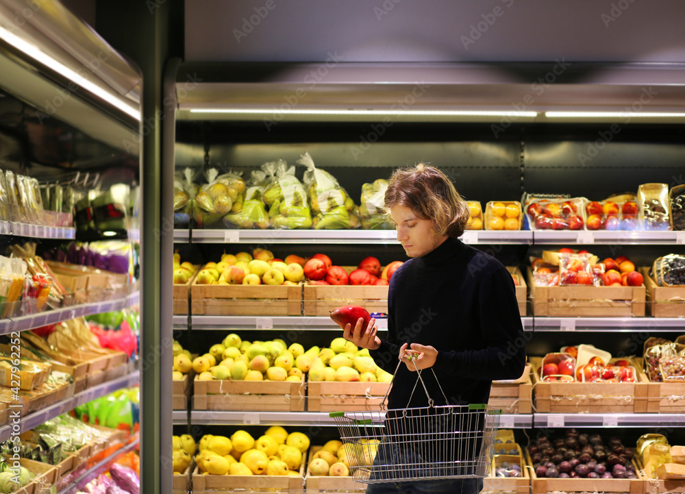 Man buying fruits at the market