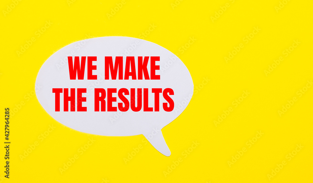 On a bright yellow background, white paper with the words WE MAKE THE RESULTS On a bright yellow background, white paper with the words WE MAKE THE RESULTS