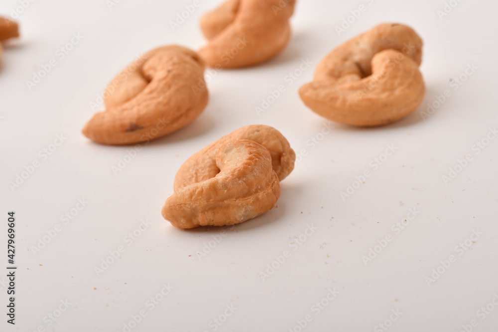 Heap of cashew nuts isolated on white background. Heap of cashew nuts isolated on white background.
