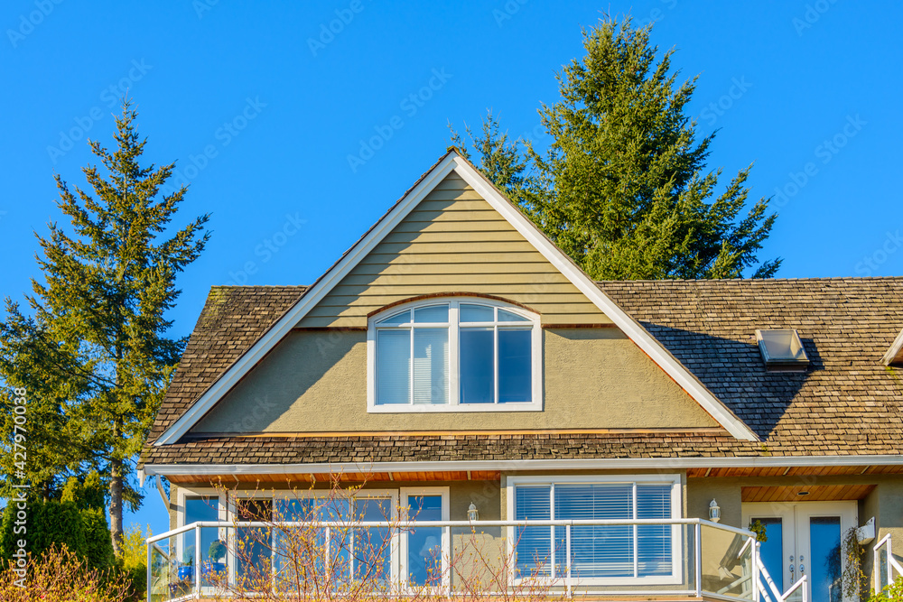 the top of the house under the blue sky the top of the house under the blue sky