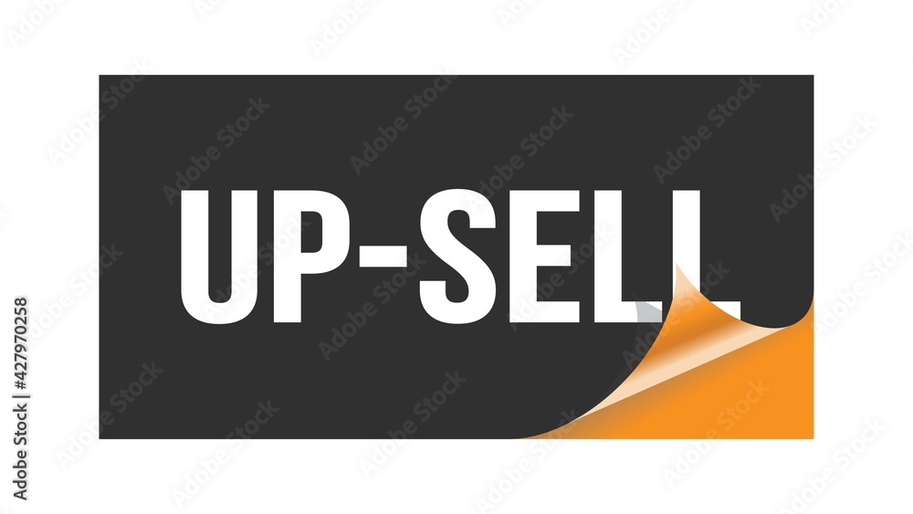 UP-SELL text written on black orange sticker. UP-SELL text written on black orange sticker.