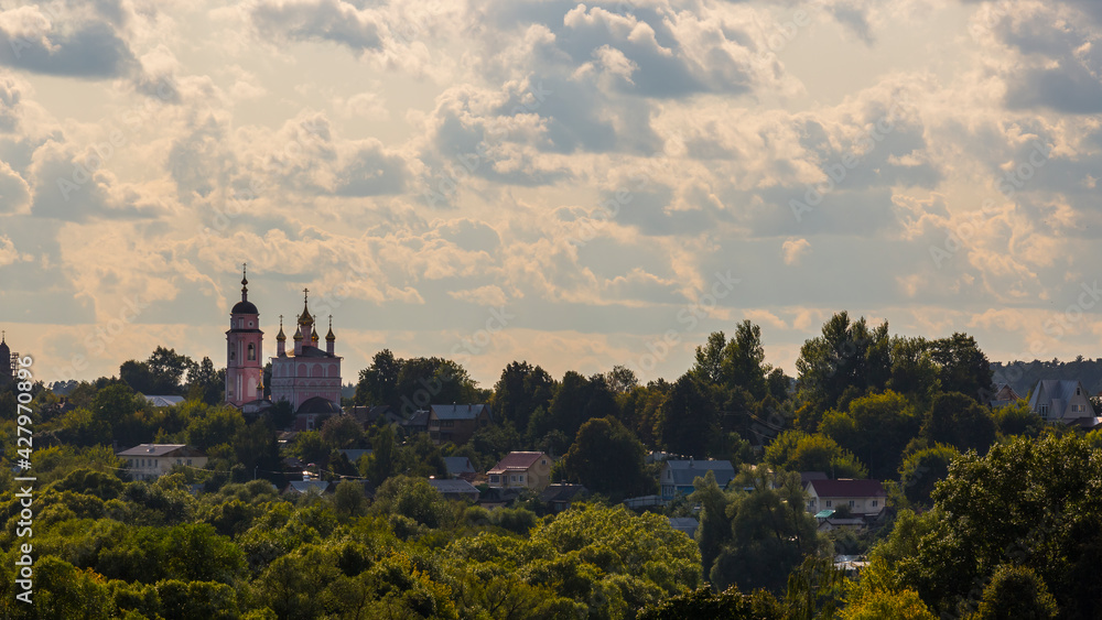 Orthodox church near the river, summer day in Russian town Borovsk
