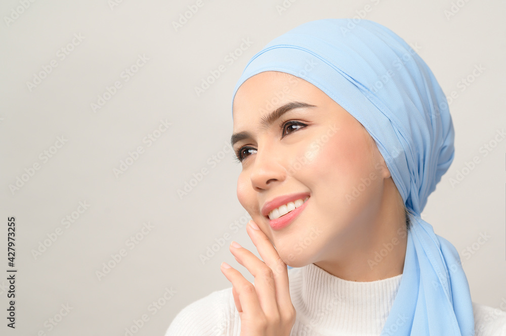 close up of young beautiful muslim woman with hijab isolated on white background studio, muslim beauty skin care concept. close up of young beautiful muslim woman with hijab isolated on white background studio, muslim beauty skin care concept.