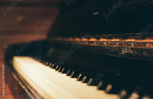 Piano keys. Side view with shallow depth of field
