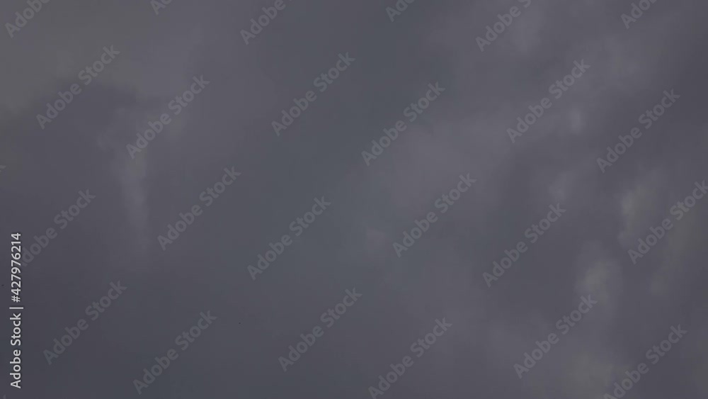 Dark grey stormy clouds. Time lapse Dark grey stormy clouds. Time lapse