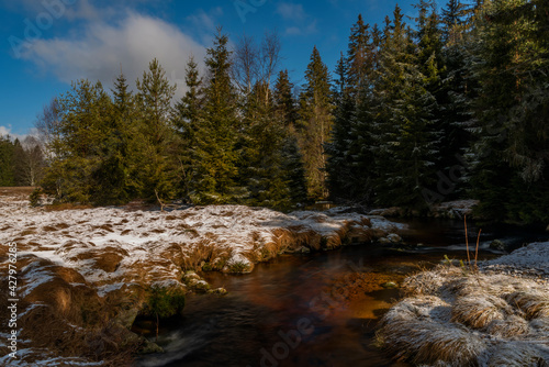 Fototapeta Naklejka Na Ścianę i Meble -  Svetla creek in winter snowy cold morning with sunshine light