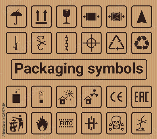 A set of black and white packaging symbols on a cardboard background.Compliance signs, Manipulation signs,Environmental signs, Warning signs .For boxes, infographics, infographics.