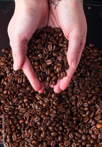 coffee beans in hands