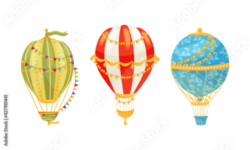Hot Air Balloon as Light Aircraft with Envelope and Gondola Decorated with Flag Garland and Tassels Vector Set