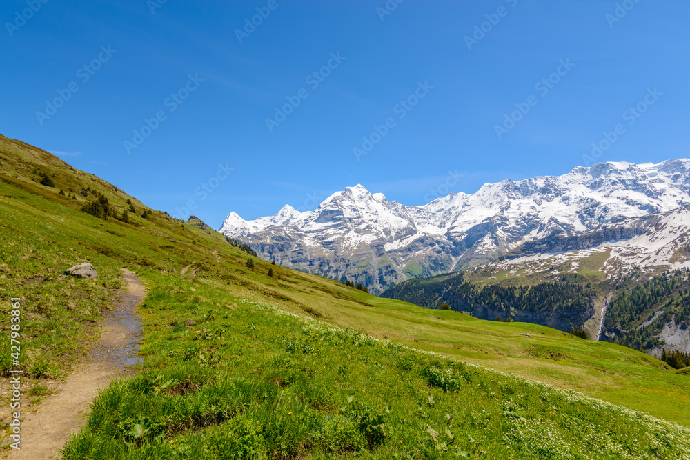 Crossing the Alps. Hiking trail in the Alps. Murren. Switzerland. Crossing the Alps. Hiking trail in the Alps. Murren. Switzerland.