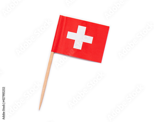 Fotografía Paper flag of Switzerland on wooden toothpick isolated on white