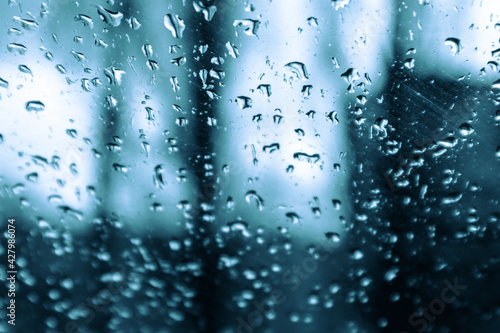 Raindrops on glass. Wet window from the rain